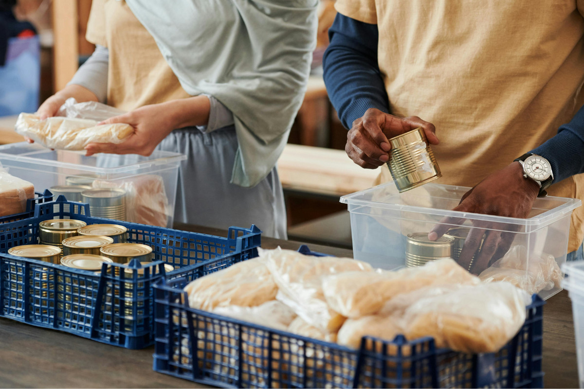 Volunteers organizing a food pantry for a global cause.
